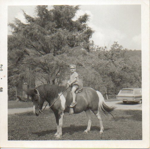 Charlie riding Princey at Uncle Mike's farm