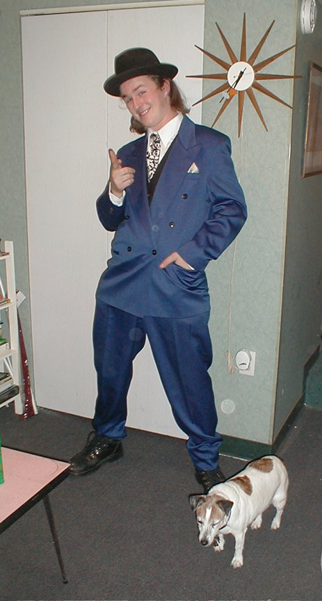 Max, Olga, and his Blue sharkskin suit